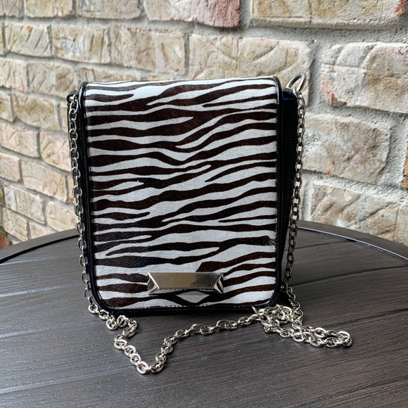 Zebra and black crossbody with silver chain strap. New condition. - Picture 1 of 6